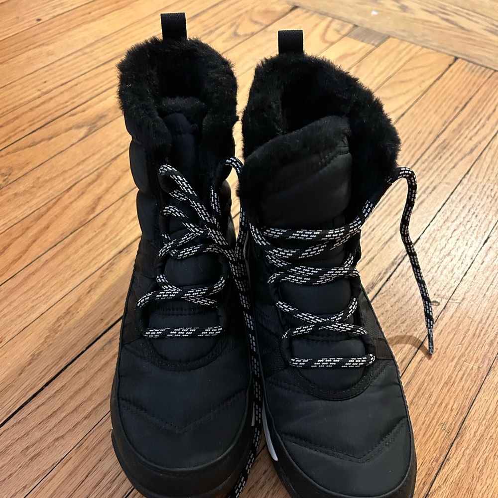 Sorel waterproof lace up boots.